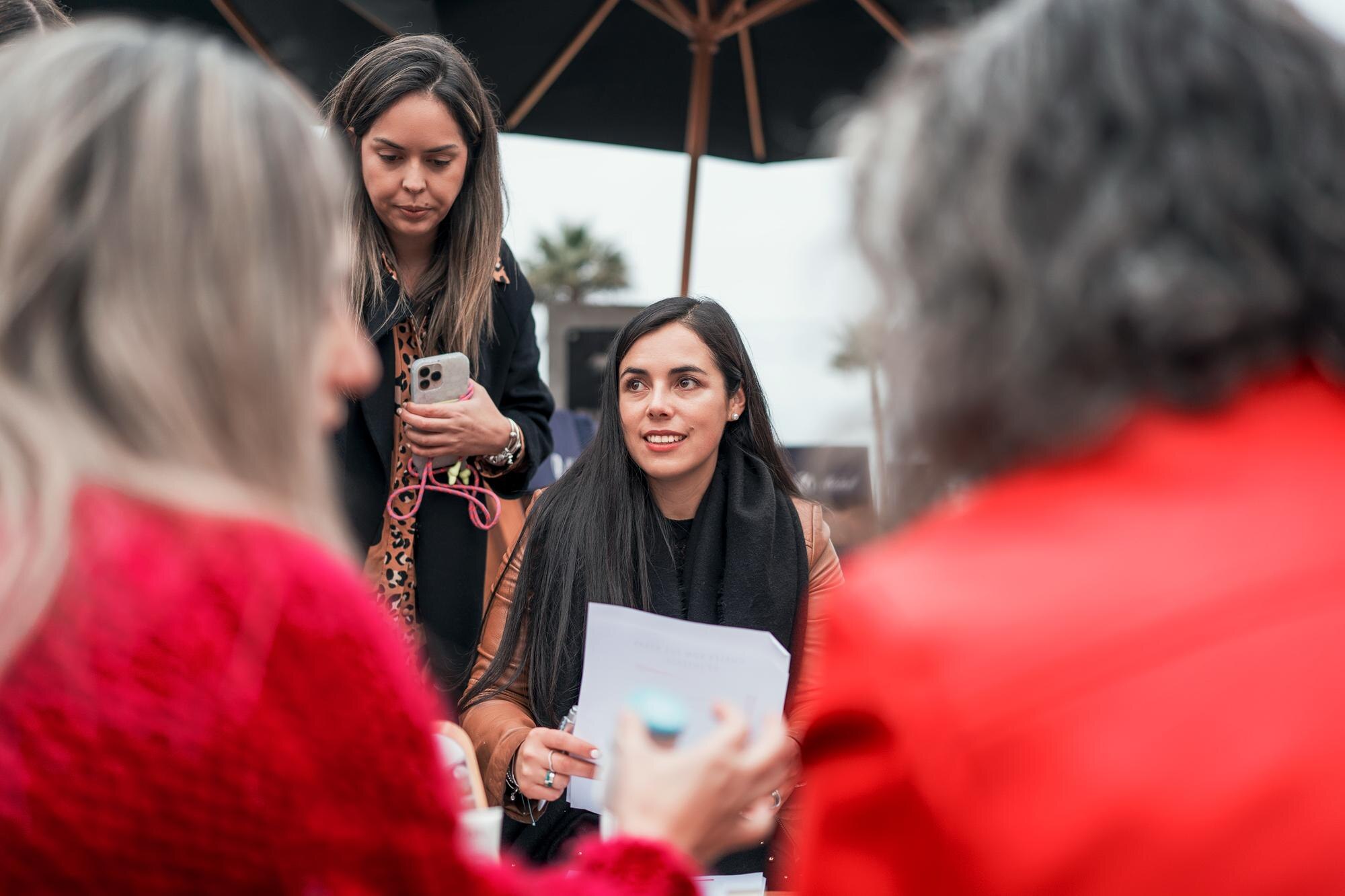 latin business women meeting with customers outdoors 535168 1083